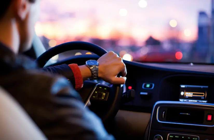 Test drives – person driving at dusk